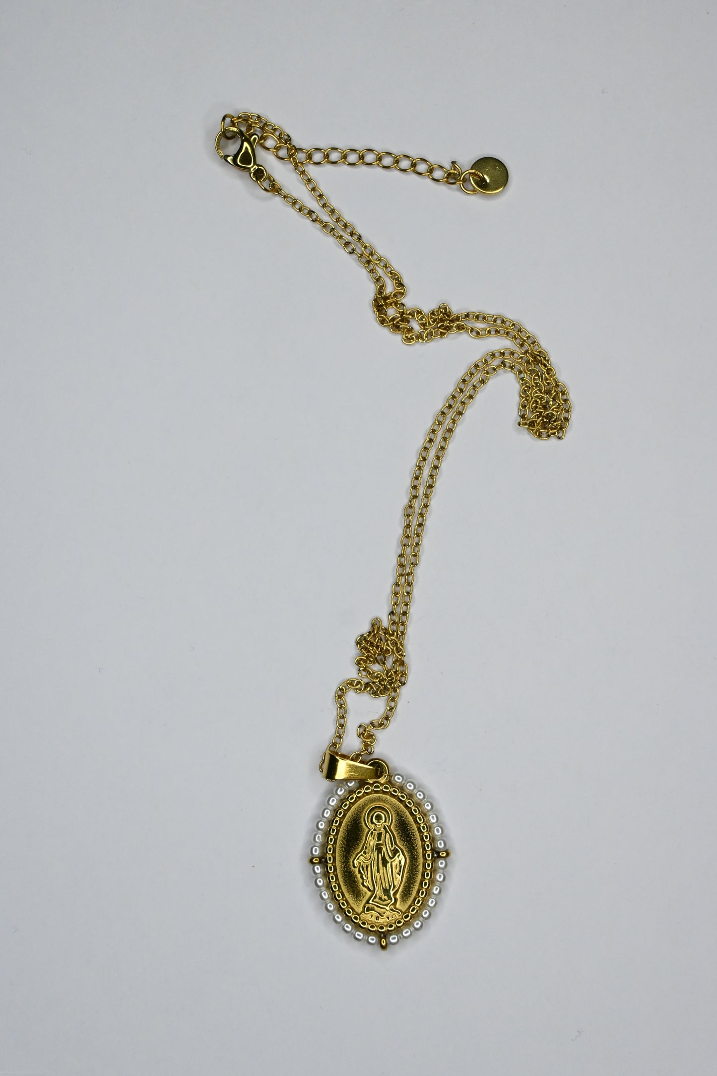 Medalha com santos